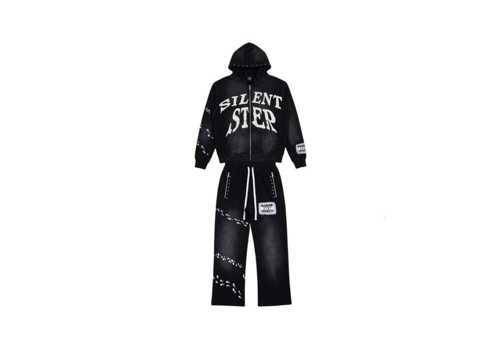 A black hooded sweatshirt and matching wide-leg pants set with white graphic text reading 'SILENT STEP' on the hoodie and white footsteps designs 