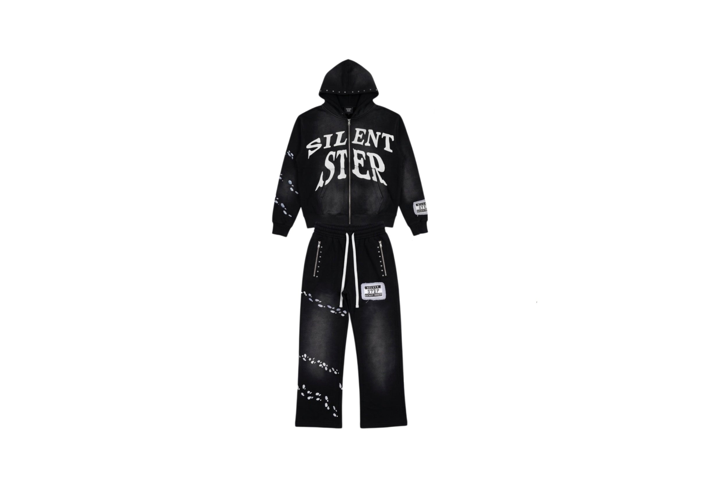 A black hooded sweatshirt and matching wide-leg pants set with white graphic text reading 'SILENT STEP' on the hoodie and white footsteps designs 